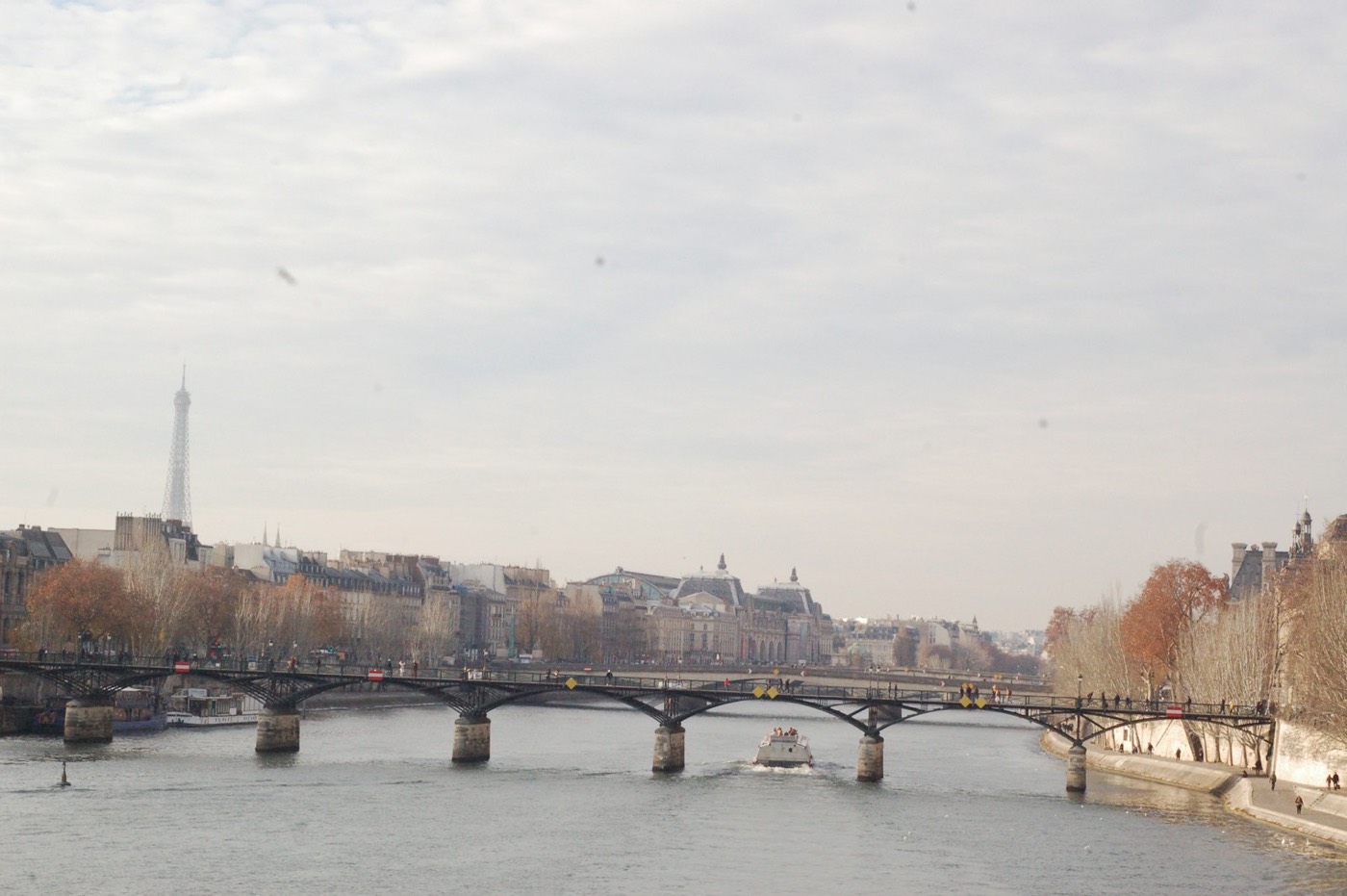 A historic bridge crossing the Seine in central Paris